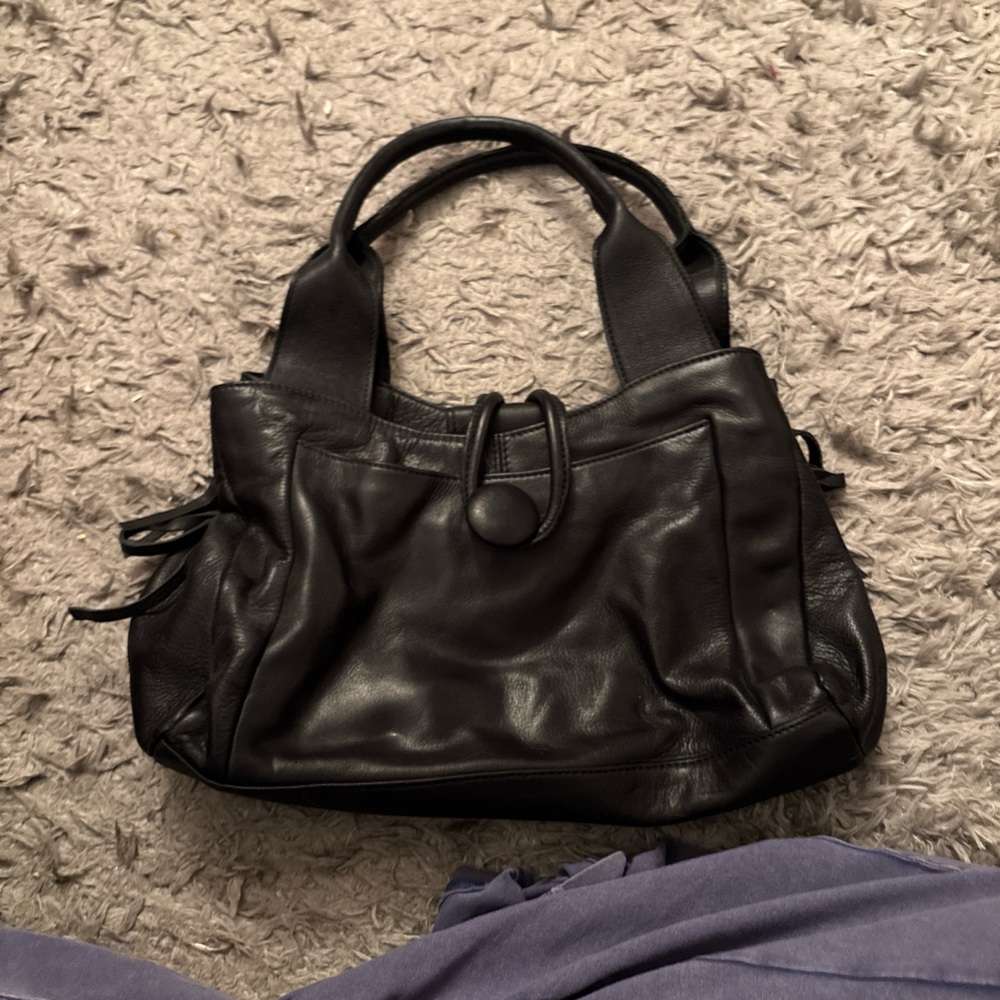 Black leather handbag with a touch of glamour #glamourbag